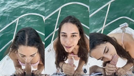 Durante o passeio de barco, a cadela Izzy Green aproveita para se ajoelhar e fazer um boquete no dono da lancha