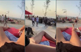 Brincando na beira do mar e tocando a xoxota lisa
