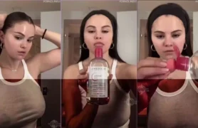 Selena Gomez, a cantora, tá dando uma passada nos stories mostrando os peitos e os mamilos dela com uma blusinha bem transparente